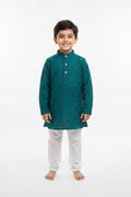 6-year-old boy in teal green Chikankari Kurta with white pyjama
