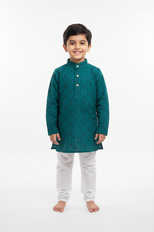 6-year-old boy in teal green Chikankari Kurta with white pyjama