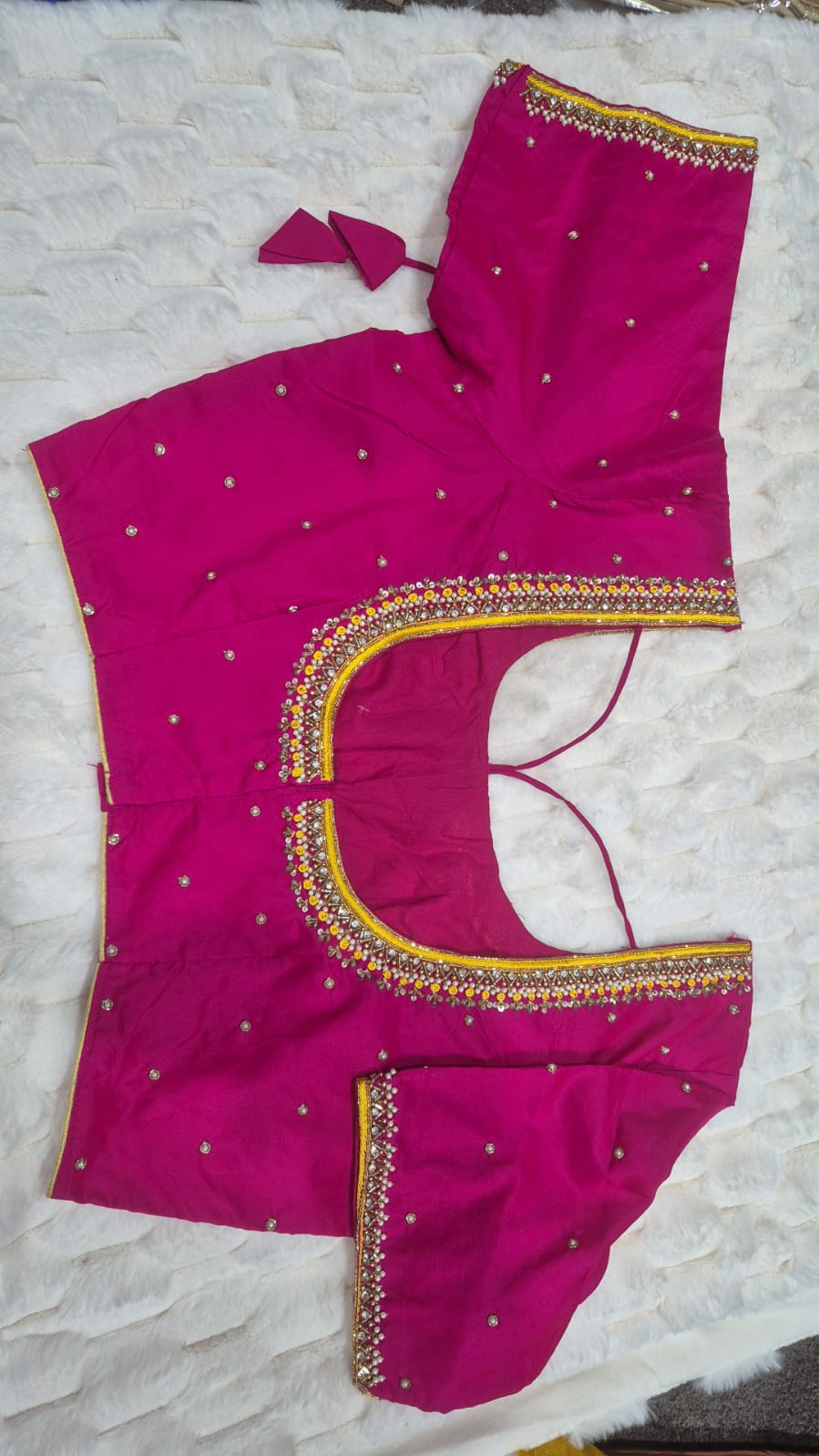 Hot pink multicolour beaded border saree blouse - front view showing deep U-back opening and crystal border