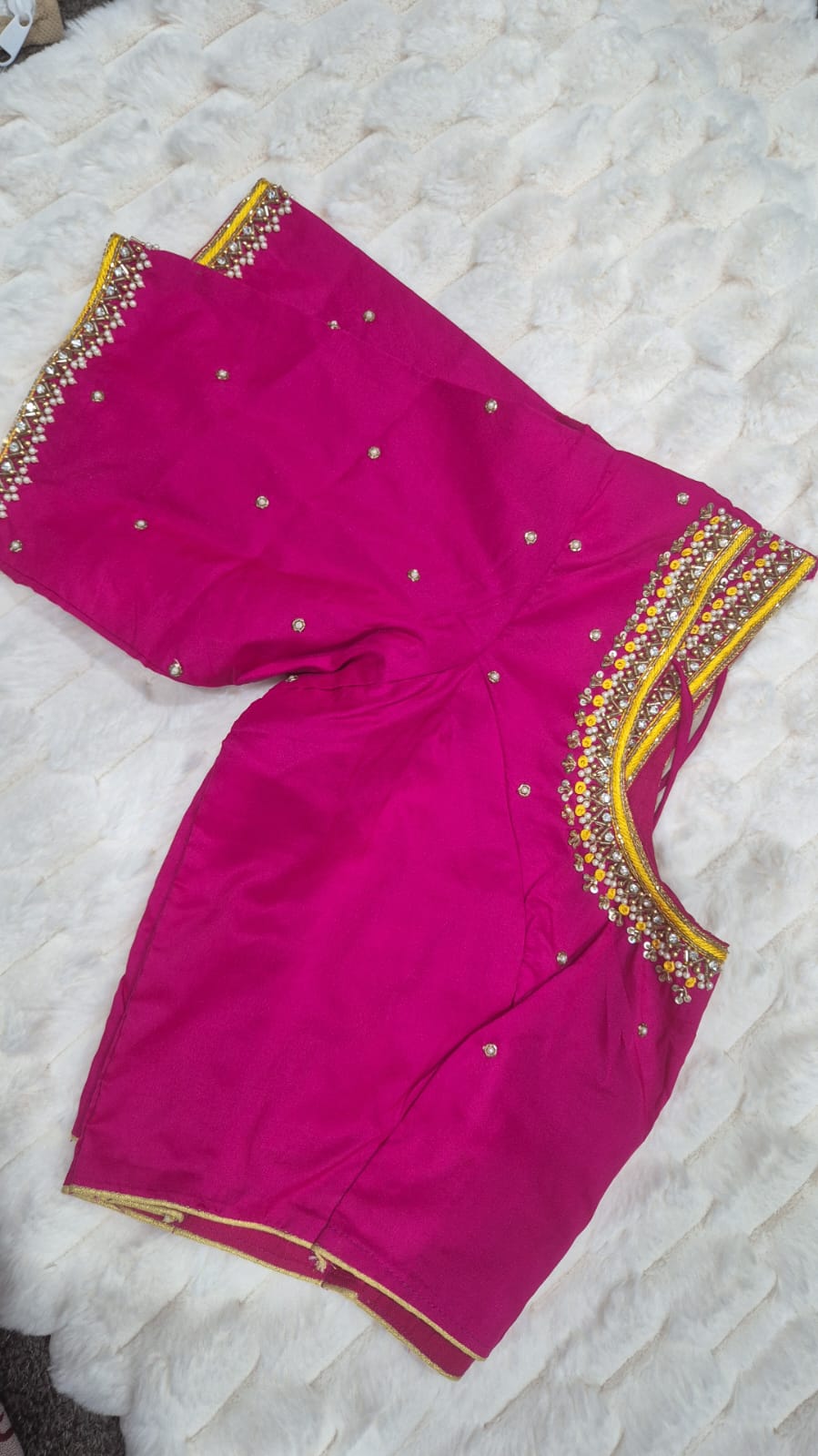 Hot pink multicolour beaded border saree blouse - back view showing beaded border on sleeves and scattered mirror motifs