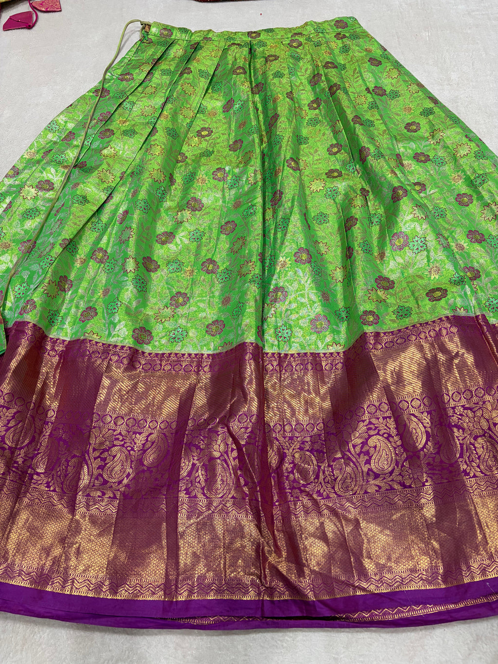 Parrot green lehenga skirt with purple zari border