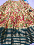 Cream Kalamkari lehenga skirt with bottle green zari border