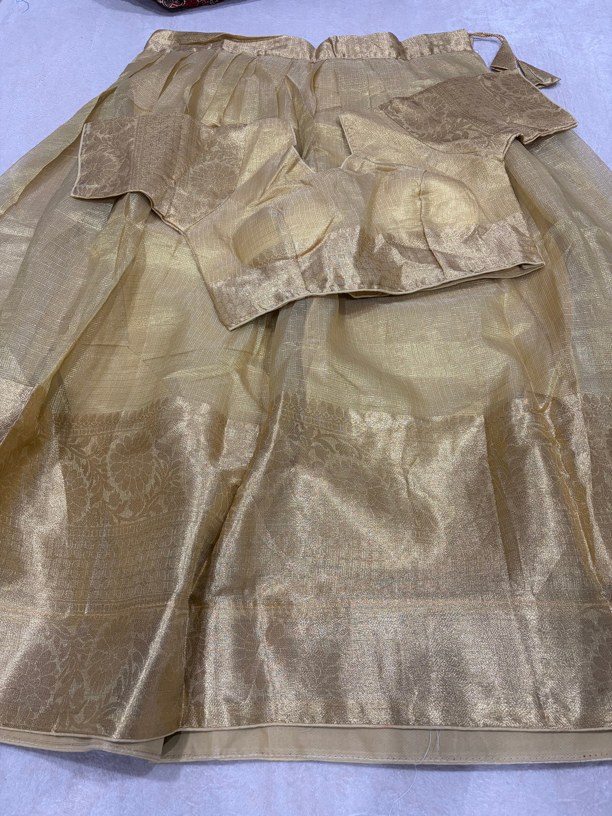 Golden tissue lehenga skirt with matching blouse