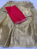 Golden tissue lehenga full set with red embroidered dupatta