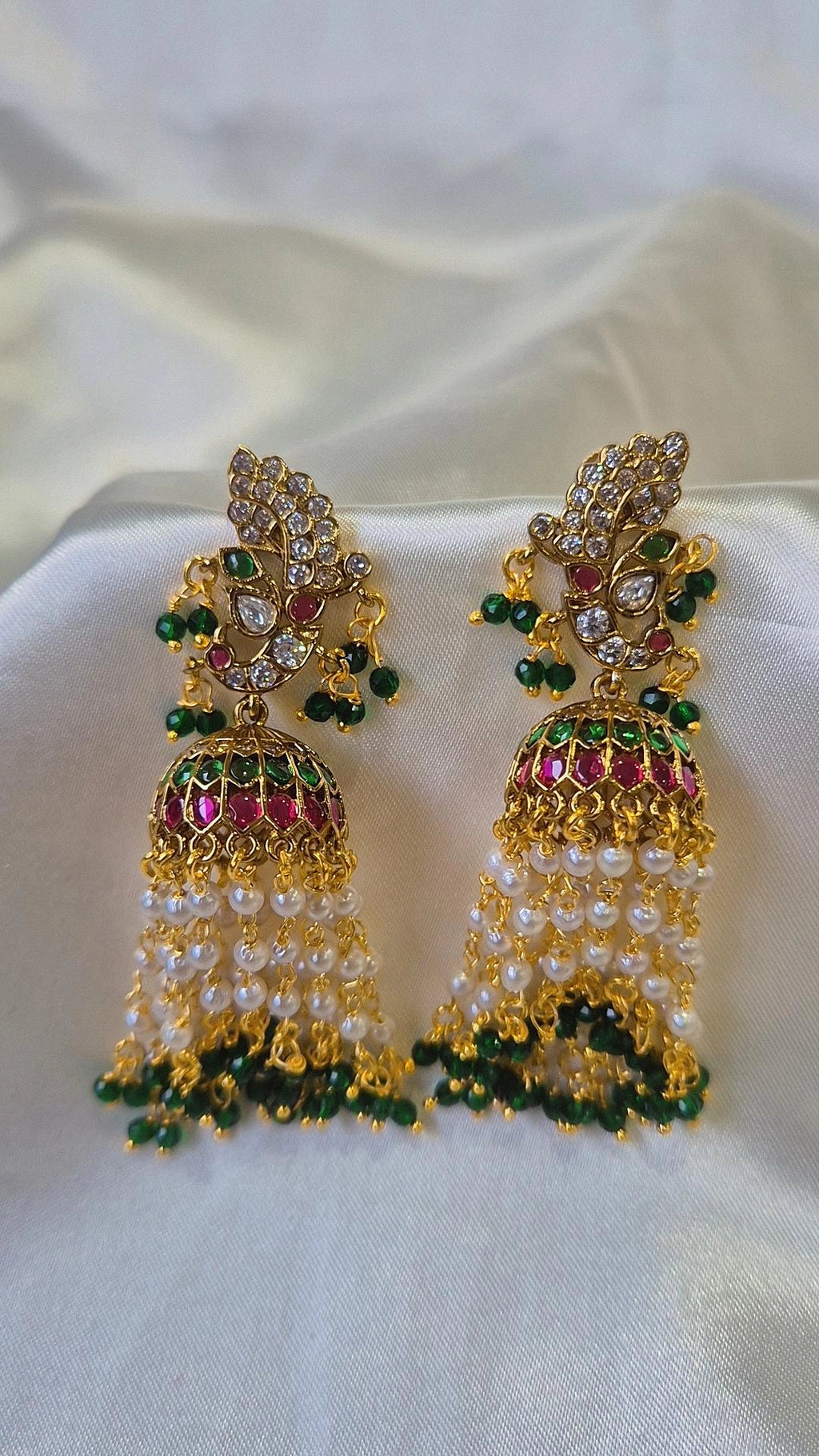 Gold Peacock Tassel Jhumka Earrings