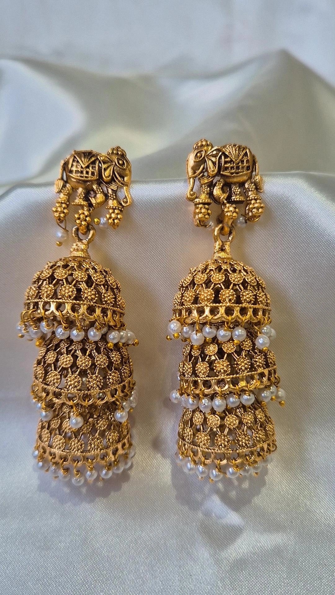 Gold Antique Elephant Triple-tier Jhumka Earrings