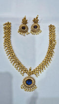 Blue sapphire antique gold kundan pearl drop necklace set with matching chandelier earrings