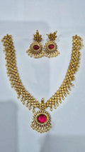 Ruby pink antique gold kundan pearl drop necklace set with matching chandelier earrings