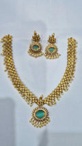 Teal antique gold kundan pearl drop necklace set with matching chandelier earrings