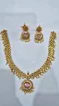 Blush pink antique gold kundan pearl drop necklace set with matching chandelier earrings