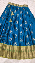 Kids pattu pavada teal silk skirt with bird brocade motifs and gold zari border