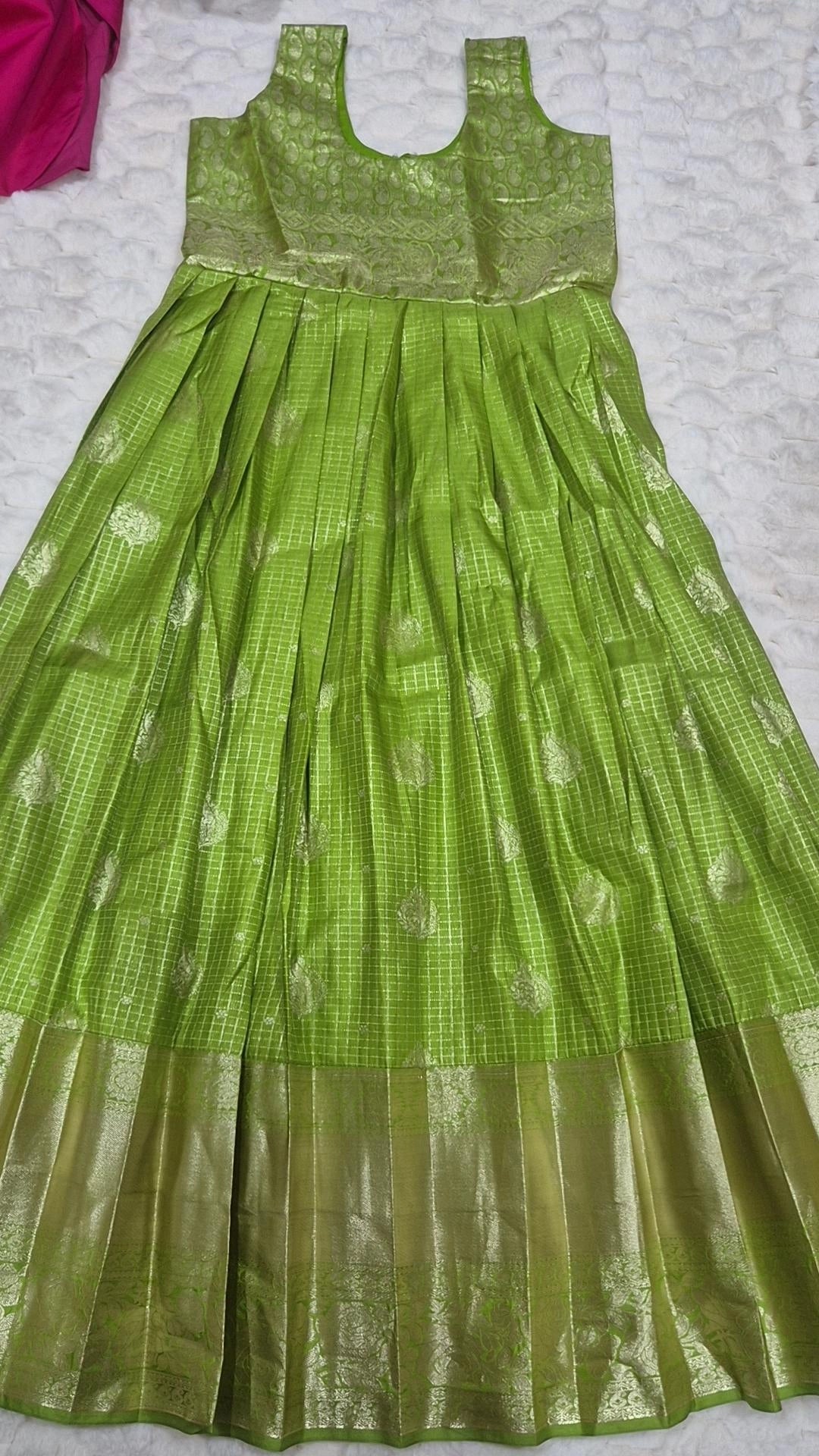 Kids pattu pavada parrot green tissue silk skirt with gold check pattern and gold zari border