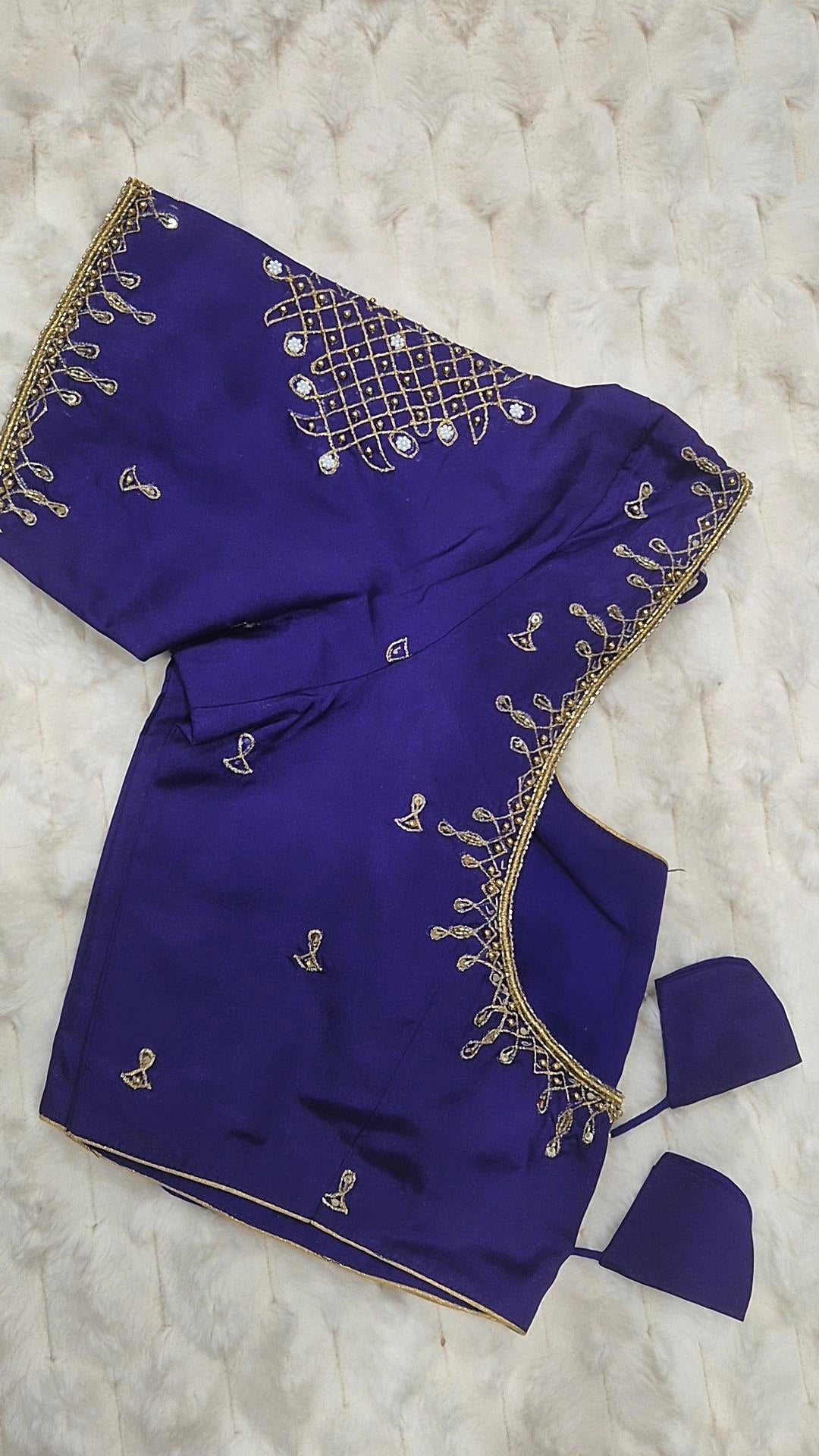 Royal blue diamond lattice embroidery saree blouse - showing gold geometric lattice on shoulder and teardrop motifs