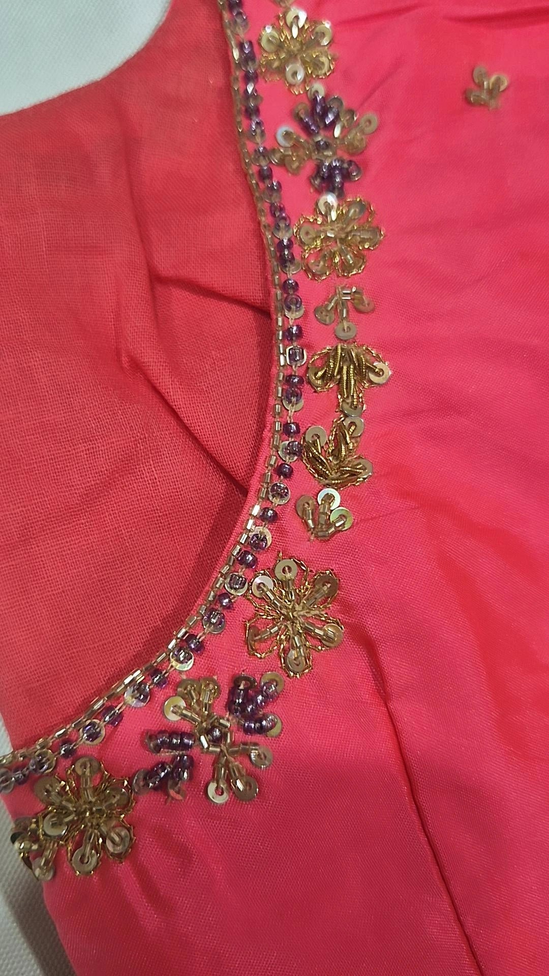 Coral pink hand work saree blouse - neckline detail