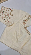 Cream floral hand work saree blouse - front view