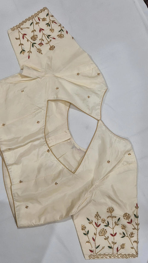 Cream floral hand work saree blouse - back view