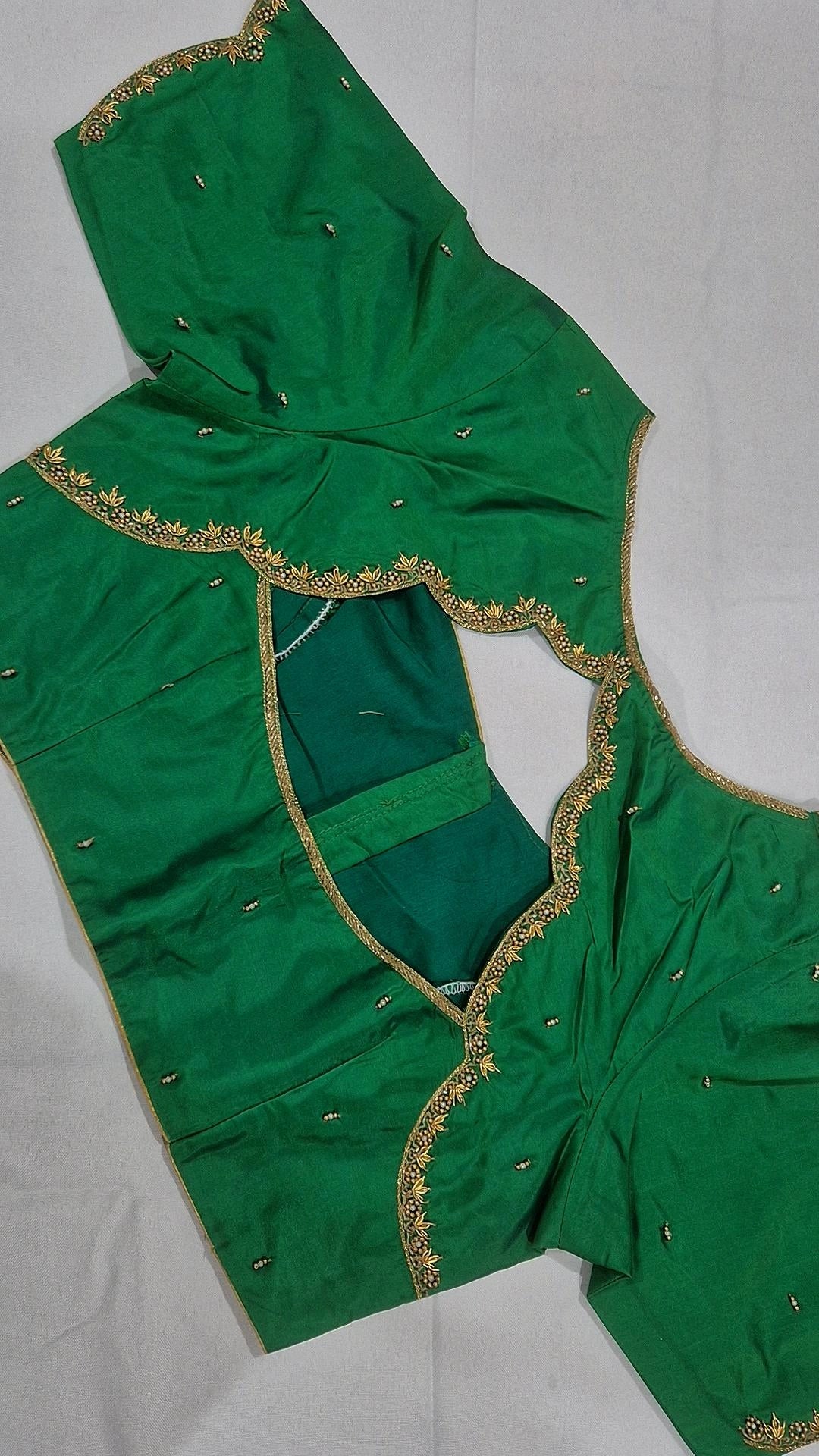 Emerald green scalloped saree blouse - back view showing opening