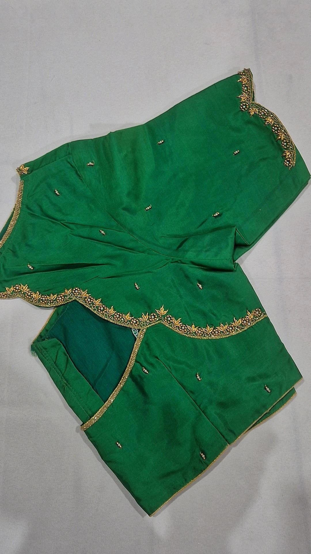Emerald green scalloped saree blouse - front view