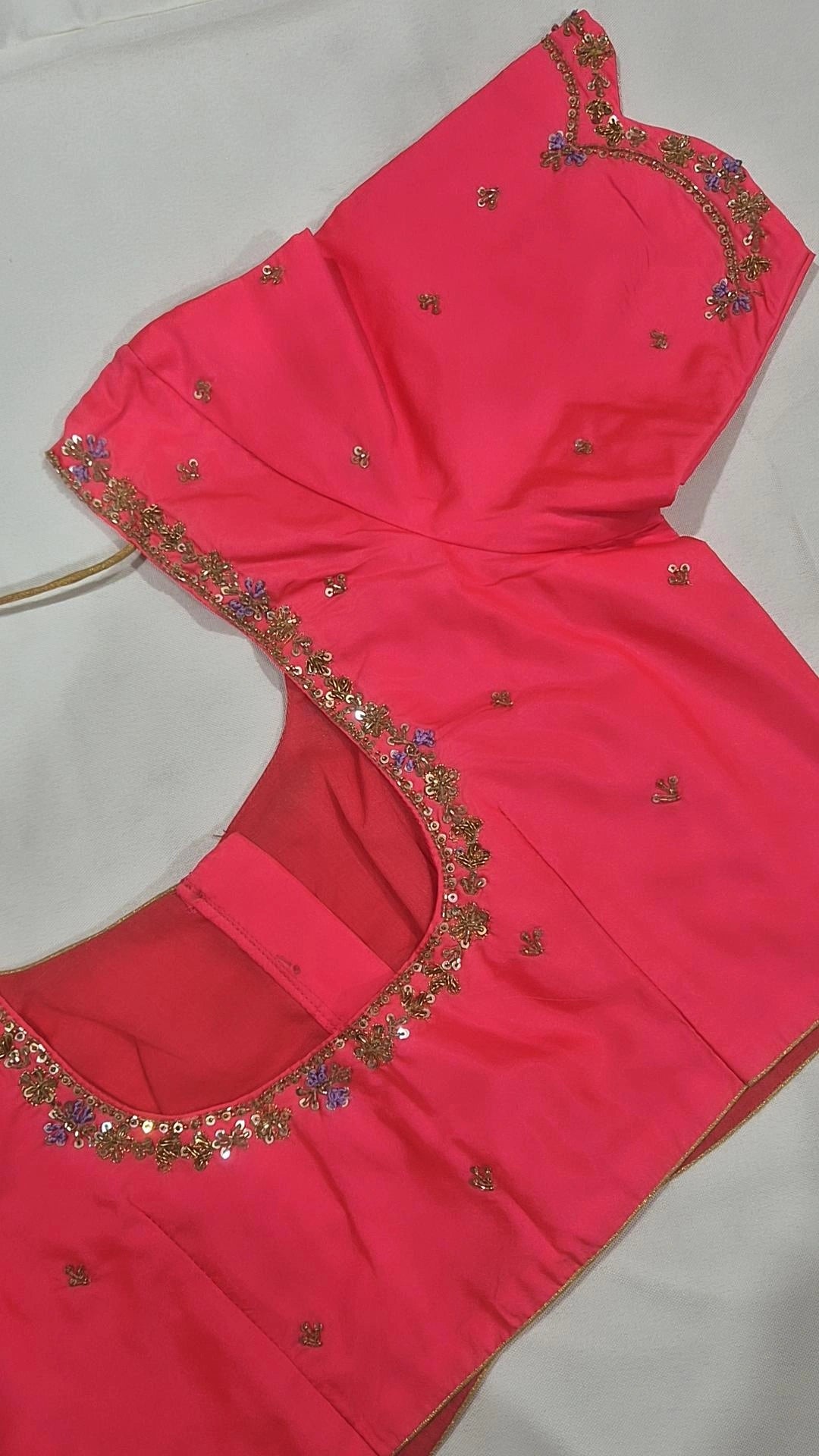 Hot pink sequin floral saree blouse - back view showing round opening