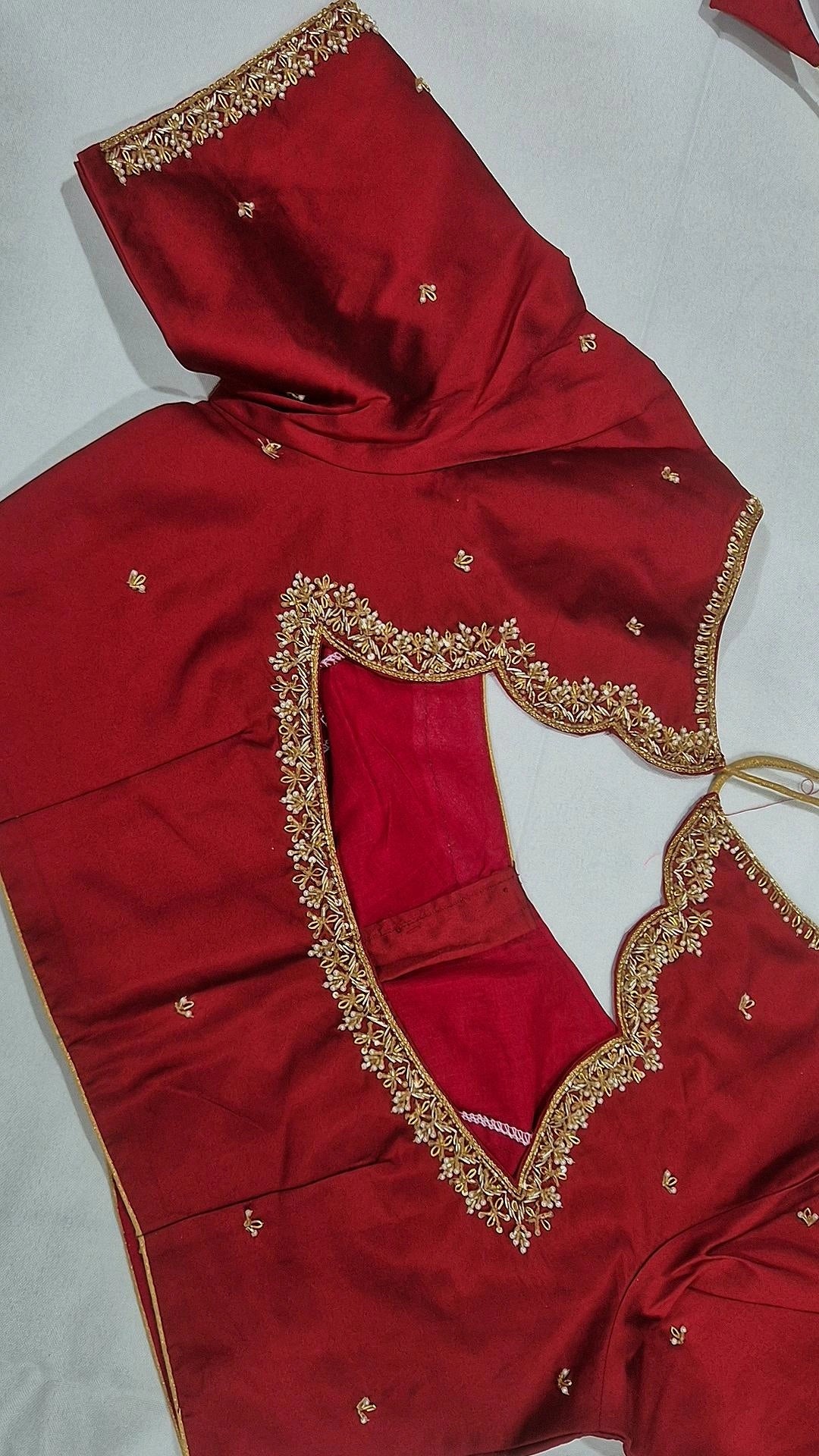 Bridal red V-back saree blouse - back view showing deep V opening