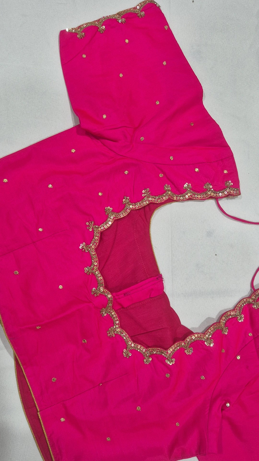 Hot pink hand work saree blouse - back view