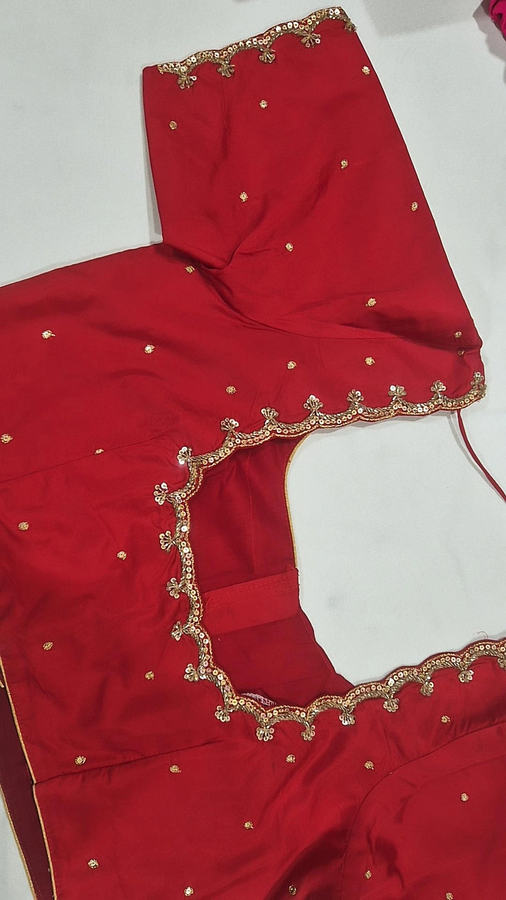 Red hand work saree blouse - back view