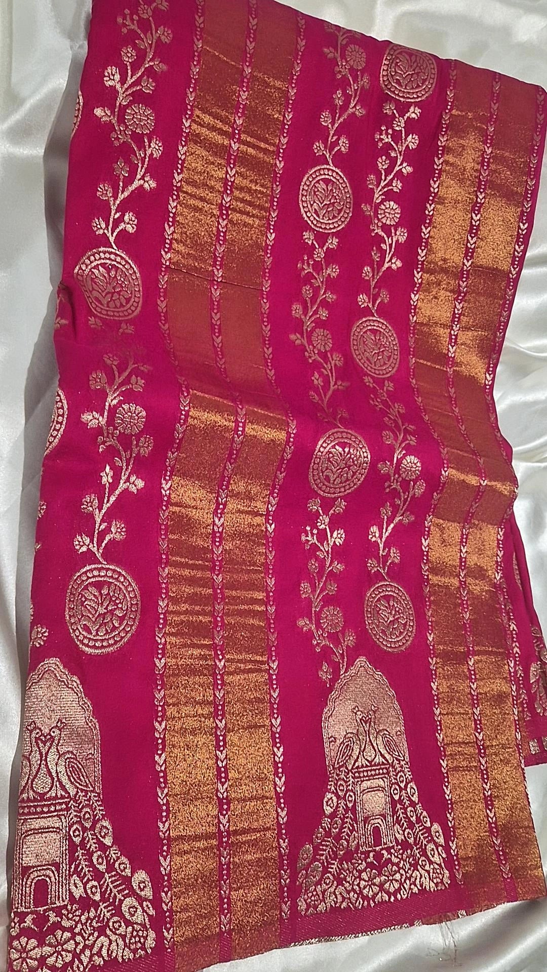 Khadi Georgette saree magenta with gold zari stripes and peacock temple arch motifs