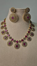Victorian ruby Bottu Mala necklace set with CZ pavé oval medallions and matching drop earrings on jewellery bust