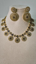 Victorian gold CZ Bottu Mala necklace set with sapphire blue links and matching circular drop earrings on jewellery bust