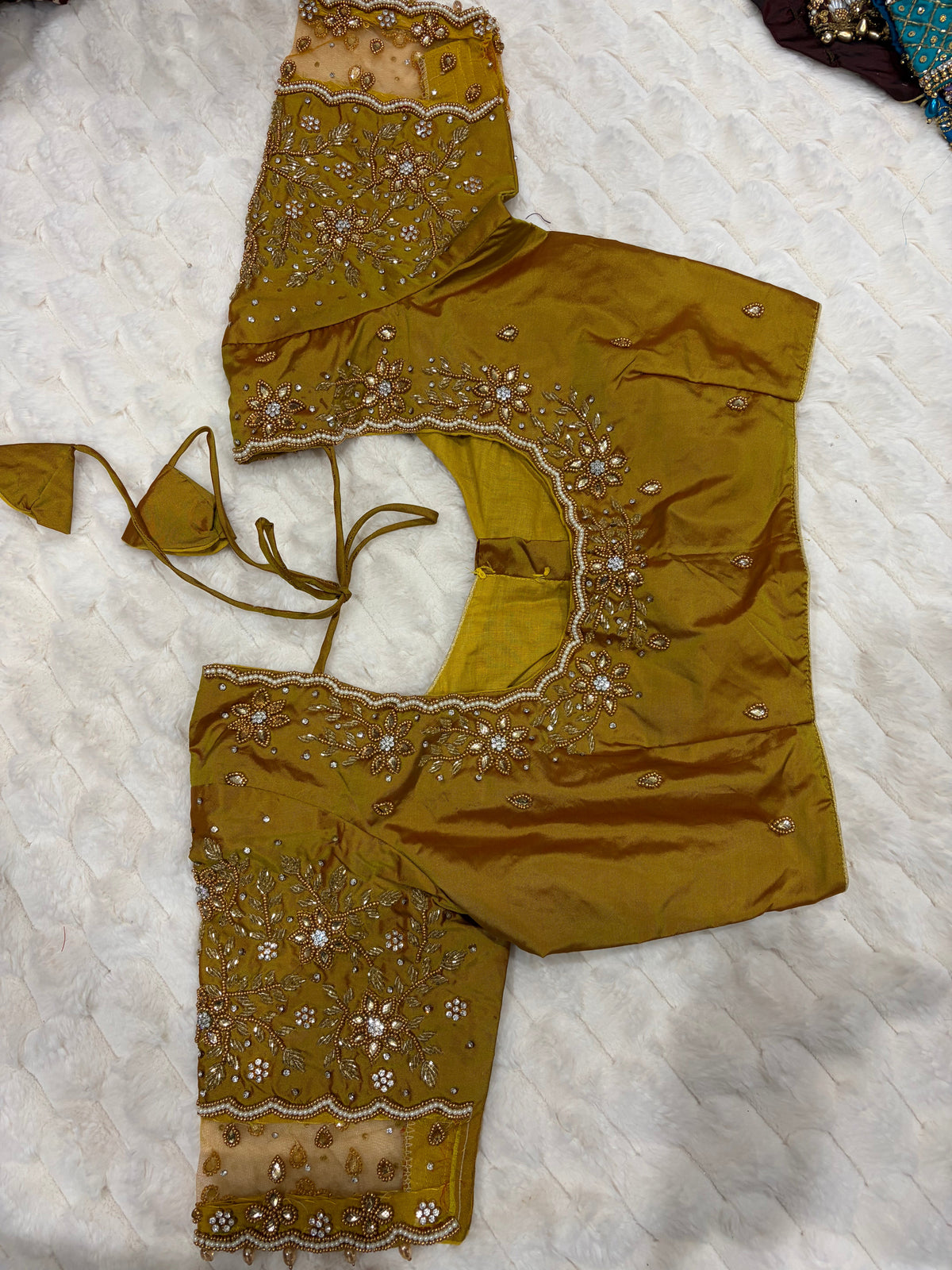 Olive gold net sleeve maggam work blouse - front view
