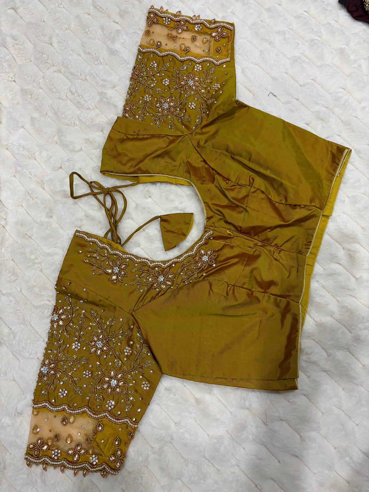 Olive gold net sleeve maggam work blouse - back view
