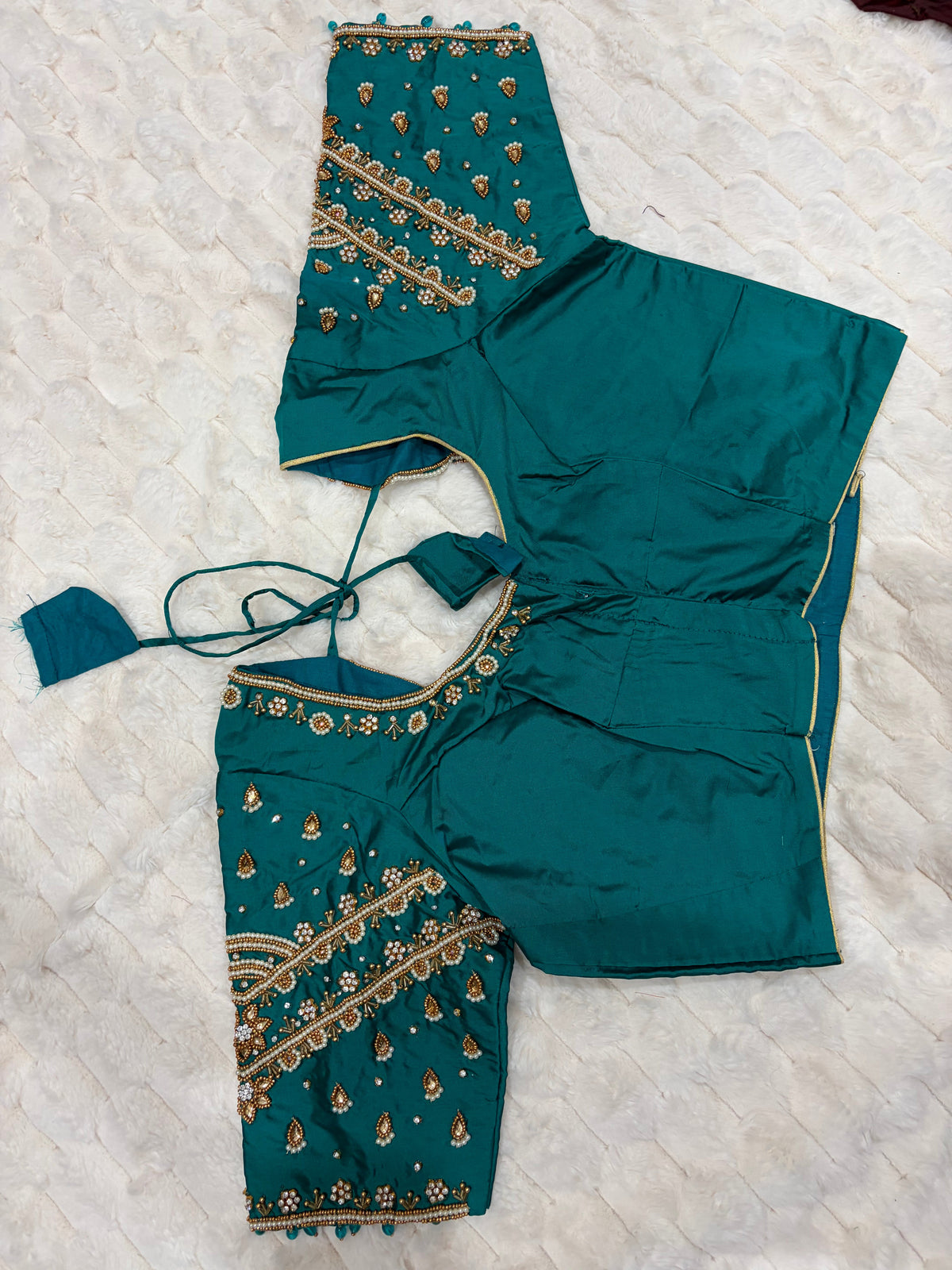 Teal green teardrop maggam work blouse - front view