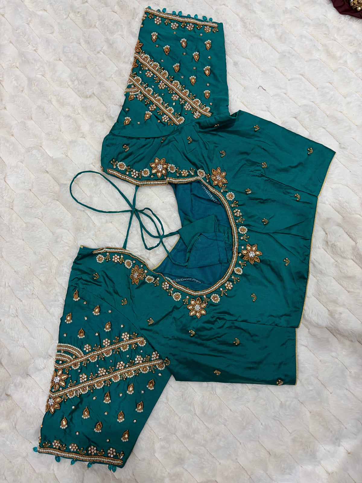 Teal green teardrop maggam work blouse - neckline and sleeve detail