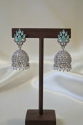 Silver Mint Blue CZ Jhumka - dark brown stand