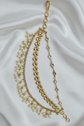 Gold Floral Pearl Ear Chain on White Satin