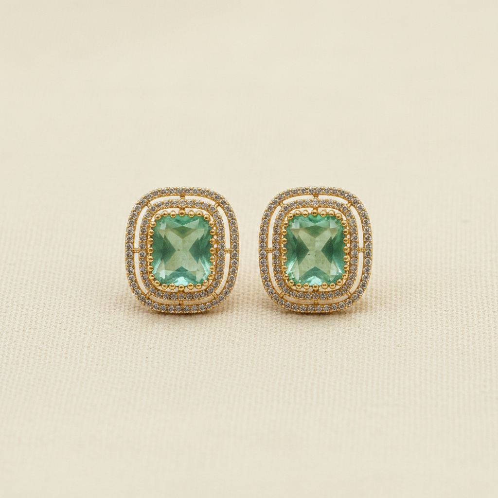 Gold Mint Green CZ Cushion Studs - cream flat lay