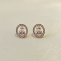 Rose Gold Cluster CZ Studs - cream flat lay