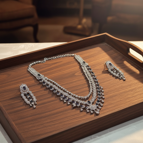 Black silver diamond necklace set on wooden tray