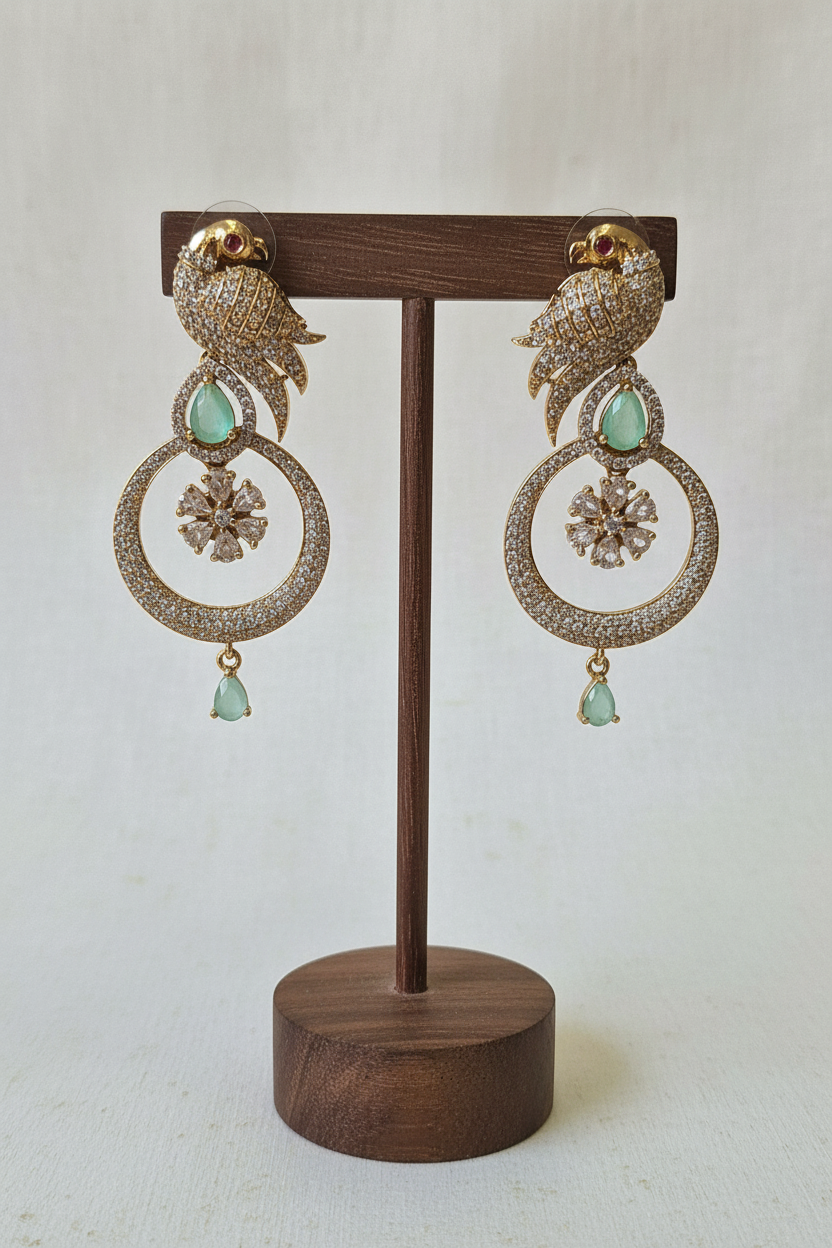 Gold Parrot Hoop Earrings - dark brown stand
