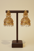 Gold Antique Lakshmi Oversized Jhumka - dark brown stand
