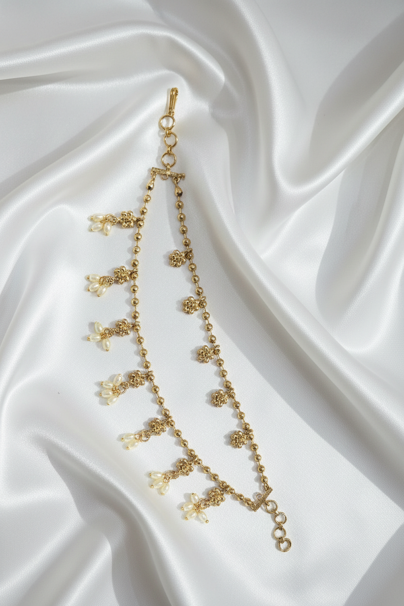 Gold Layered Pearl Ear Chain on White Satin