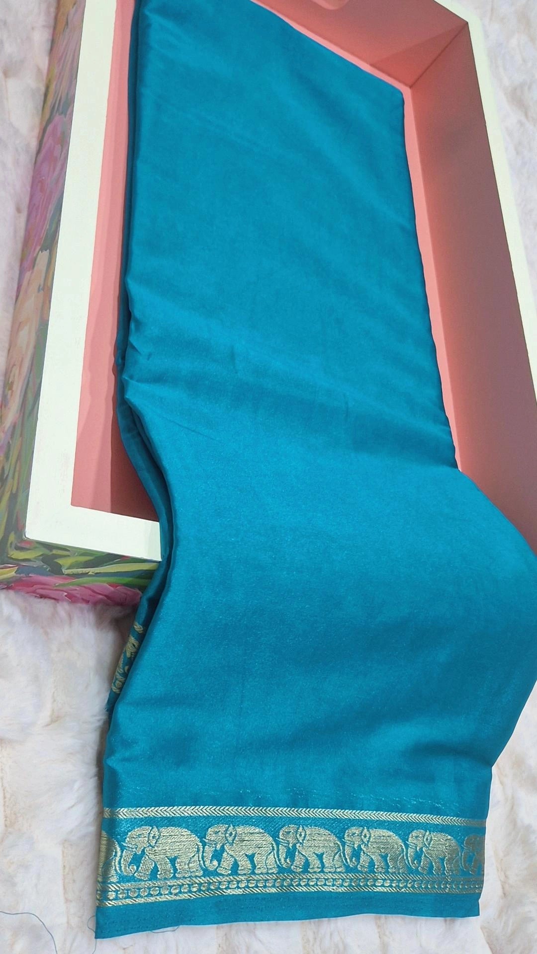 Teal Green Crepe Silk Saree with Elephant Zari Border