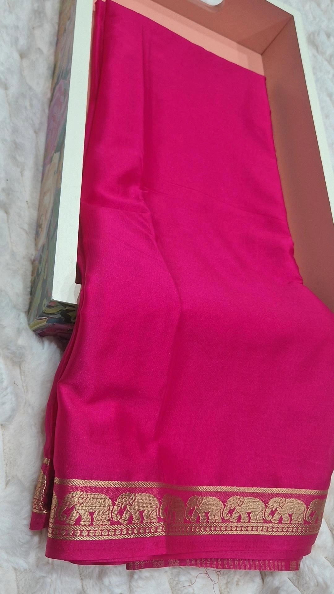 Rani Pink Crepe Silk Saree with Elephant Zari Border